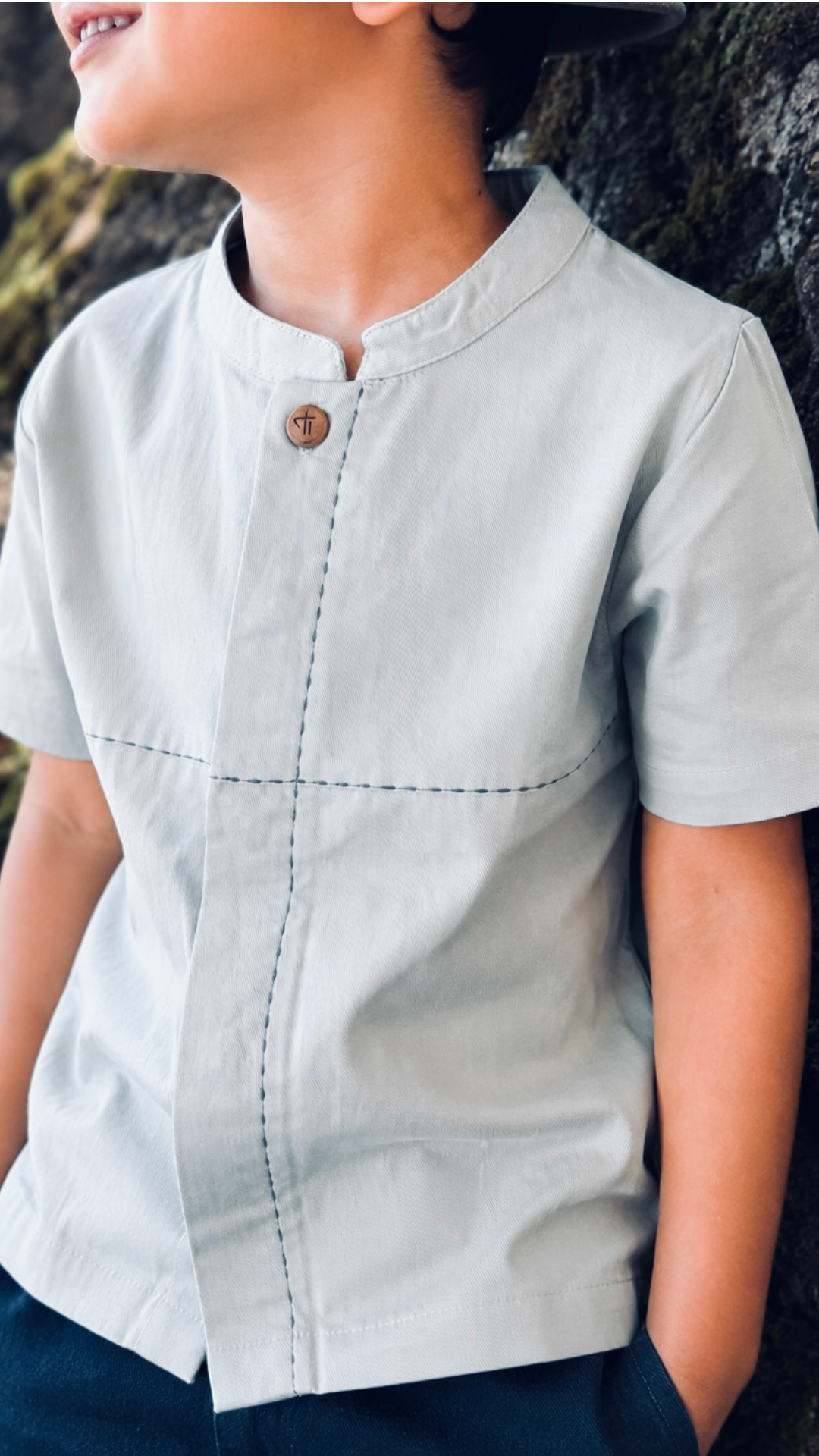 Stone Loom Shirt — boy in organic cotton linen shirt, lifestyle shot