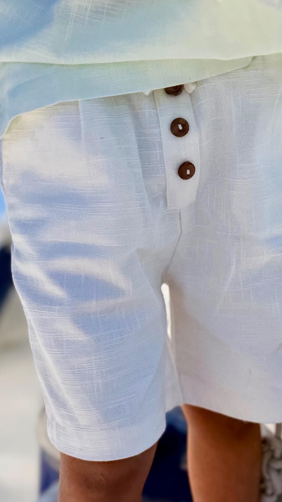 Ivory Breeze Shorts — wooden button and drawstring detail close-up