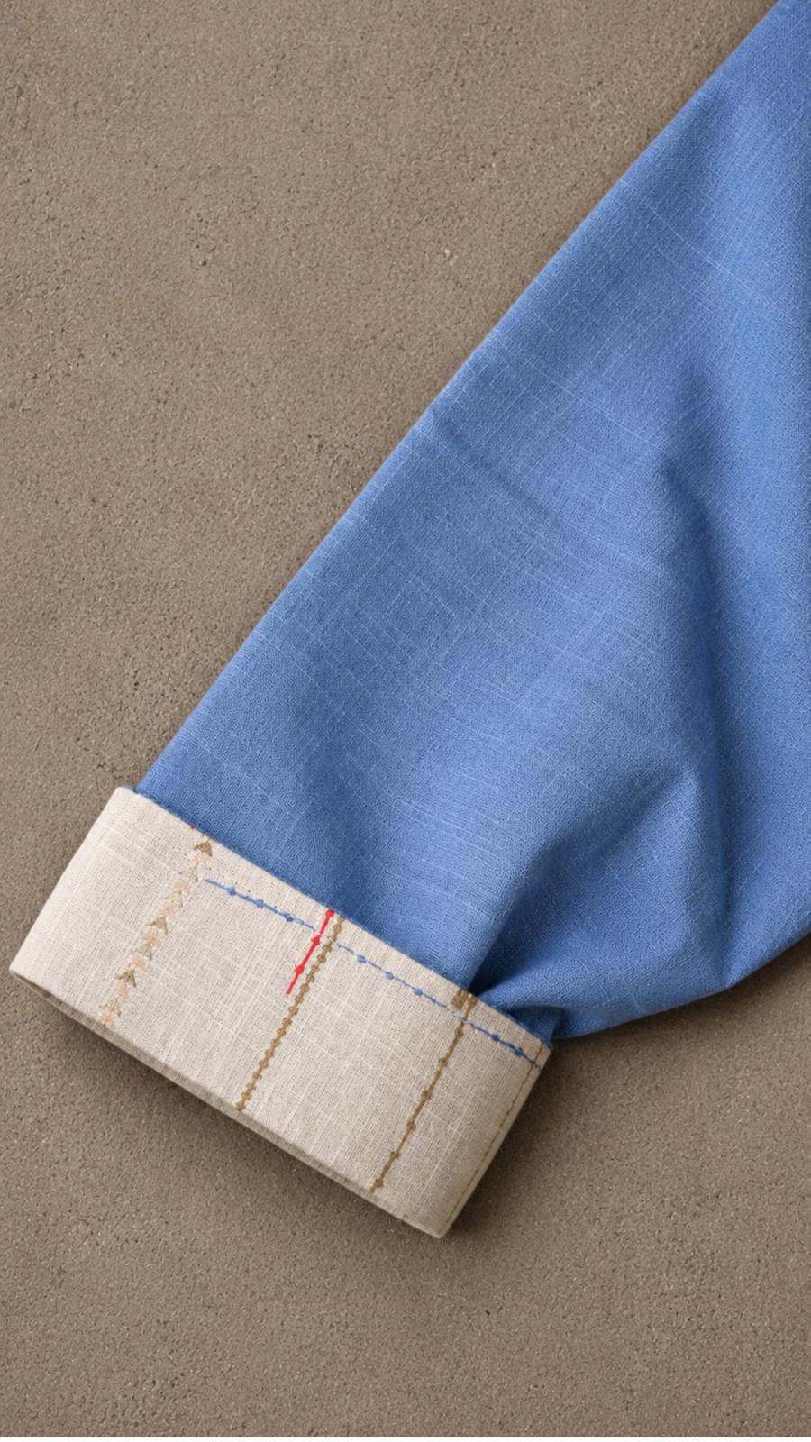 Little Mariner Classic Shirt — printed sleeve fold and collar detail close-up