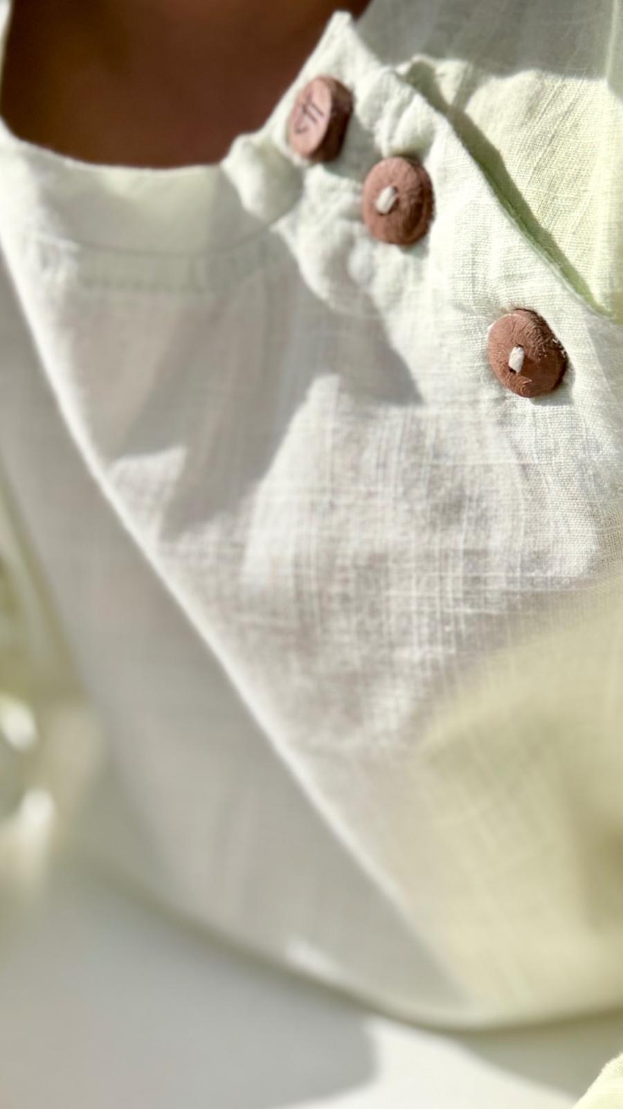 Mint Whisper Shirt — boy in mint whisper organic cotton shirt, lifestyle shot