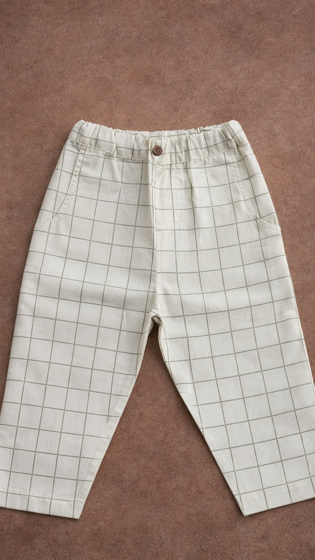 Olive Grid Cream Pants — cream cotton pants with olive windowpane, front view