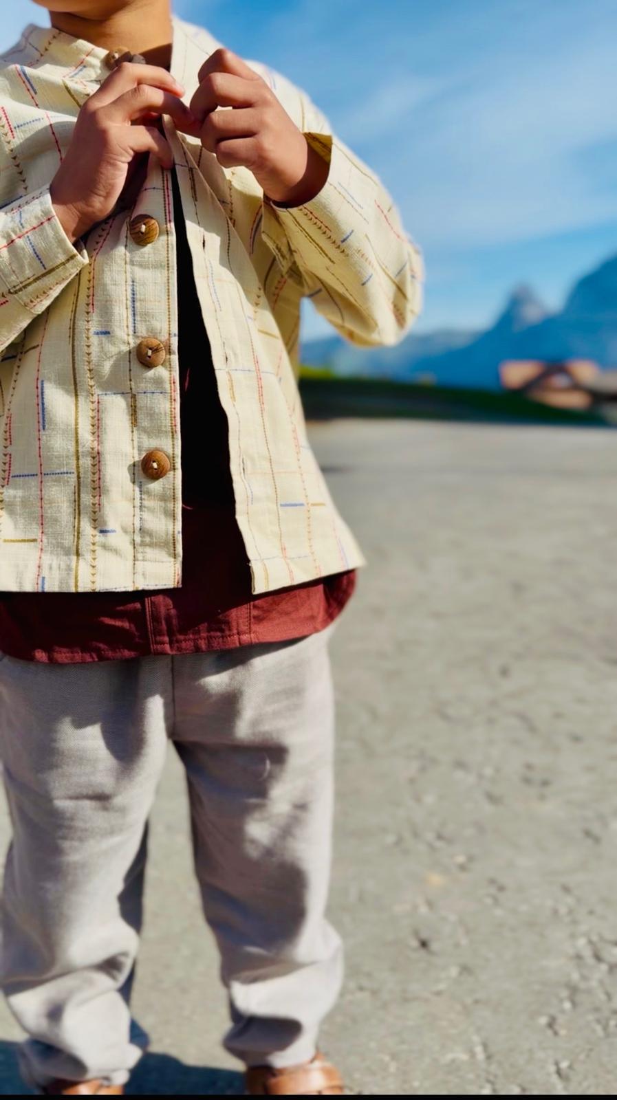 Ivory Thread-Print Cardigan — wooden button and print detail close-up