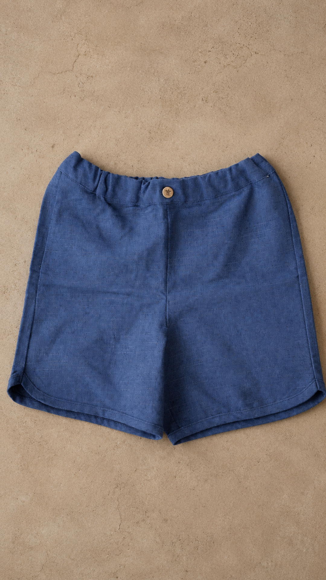 Ocean Breeze Knit Shorts — deep ocean blue cotton linen shorts for boys, front view
